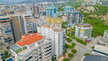 Просторная квартира 1+1 в Махмутларе в 200 метрах от моря с панорамными видами - Ракурс 29