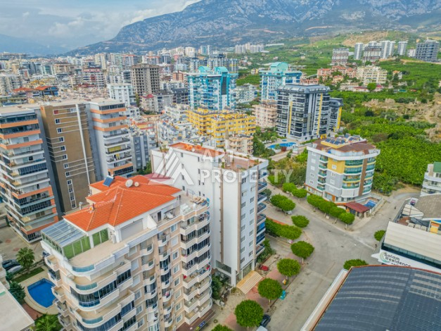 Просторная квартира 1+1 в Махмутларе в 200 метрах от моря с панорамными видами - Ракурс 28