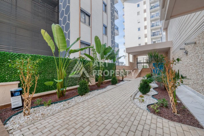 Современная квартира 1+1 в новом комплексе  в районе Махмутлар - Ракурс 18