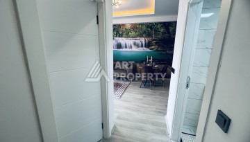 Уютная квартира 1+1 в центре Махмутлара — отличный вариант для жизни и отдыха у моря. - Ракурс 3