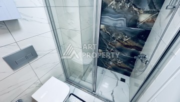 Уютная квартира 1+1 в центре Махмутлара — отличный вариант для жизни и отдыха у моря. - Ракурс 4