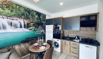 Уютная квартира 1+1 в центре Махмутлара — отличный вариант для жизни и отдыха у моря. - Ракурс 8