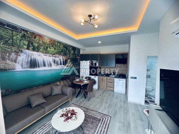 Уютная квартира 1+1 в центре Махмутлара — отличный вариант для жизни и отдыха у моря. - Ракурс 8