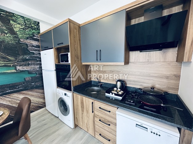 Уютная квартира 1+1 в центре Махмутлара — отличный вариант для жизни и отдыха у моря. - Ракурс 10