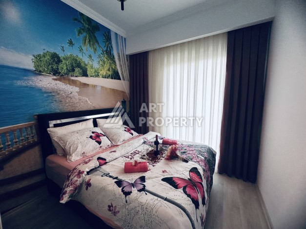 Уютная квартира 1+1 в центре Махмутлара — отличный вариант для жизни и отдыха у моря. - Ракурс 14