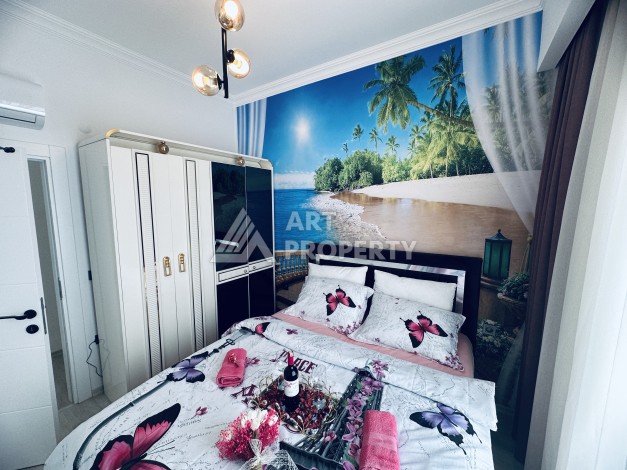 Уютная квартира 1+1 в центре Махмутлара — отличный вариант для жизни и отдыха у моря. - Ракурс 16