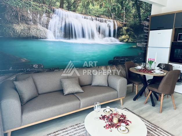 Уютная квартира 1+1 в центре Махмутлара — отличный вариант для жизни и отдыха у моря. - Ракурс 19