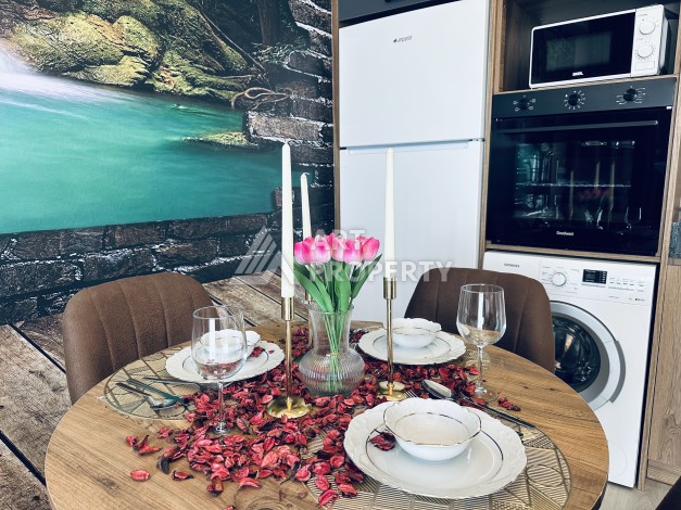 Уютная квартира 1+1 в центре Махмутлара — отличный вариант для жизни и отдыха у моря. - Ракурс 20