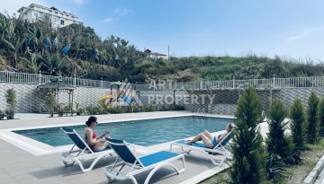 Уютная квартира 1+1 в центре Махмутлара — отличный вариант для жизни и отдыха у моря. - Ракурс 25