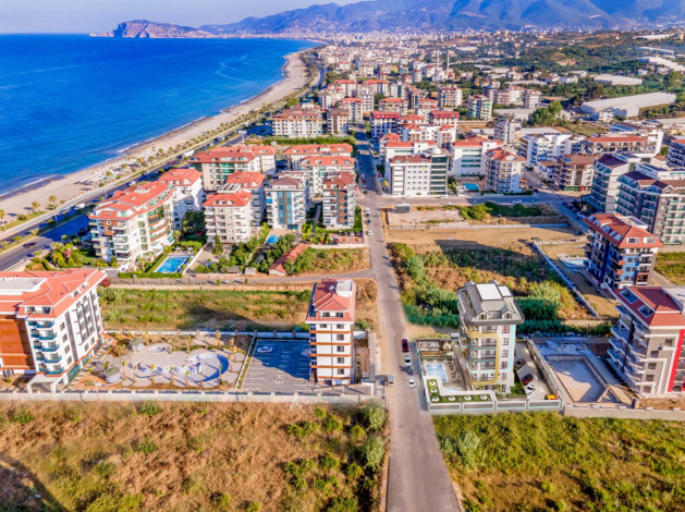 Новый инвестиционный проект у моря в районе Кестель! Различные планировки, 45-170 м2 - Ракурс 17