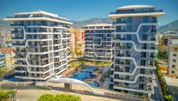 Квартиры от 58 до 242 кв.м.  в 245 метрах от моря. Тосмур,Аланья - Ракурс 1