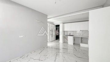 Квартира 1+1 в современном комплексе района Махмутлар - Ракурс 3