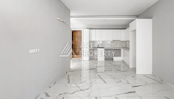 Квартира 1+1 в современном комплексе района Махмутлар - Ракурс 4