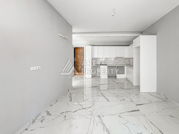 Квартира 1+1 в современном комплексе района Махмутлар - Ракурс 3