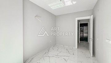 Квартира 1+1 в современном комплексе района Махмутлар - Ракурс 5