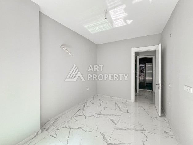 Квартира 1+1 в современном комплексе района Махмутлар - Ракурс 4