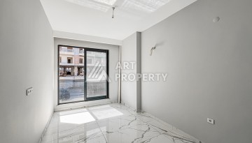 Квартира 1+1 в современном комплексе района Махмутлар - Ракурс 6