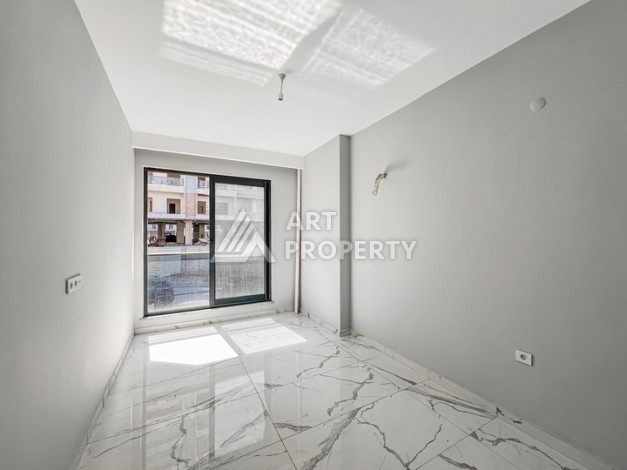 Квартира 1+1 в современном комплексе района Махмутлар - Ракурс 5