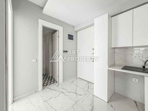 Квартира 1+1 в современном комплексе района Махмутлар - Ракурс 6