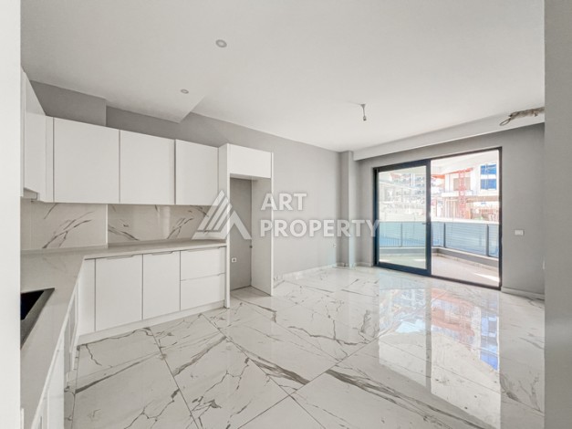 Квартира 1+1 в современном комплексе района Махмутлар - Ракурс 7