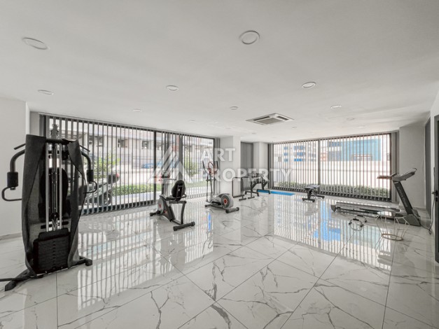 Квартира 1+1 в современном комплексе района Махмутлар - Ракурс 9