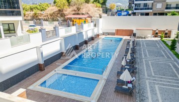 Квартира 1+1 в современном комплексе района Махмутлар - Ракурс 12