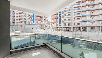 Квартира 1+1 в современном комплексе района Махмутлар - Ракурс 15