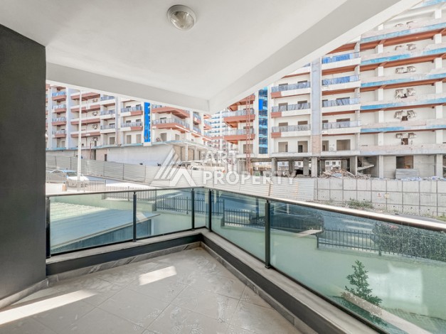 Квартира 1+1 в современном комплексе района Махмутлар - Ракурс 14