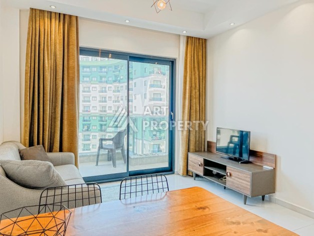 Стильная квартира 1+1 в современном комплексе  в районе Махмутлар — отличный вариант для комфортной жизни у моря. - Ракурс 1