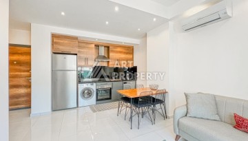 Стильная квартира 1+1 в современном комплексе  в районе Махмутлар — отличный вариант для комфортной жизни у моря. - Ракурс 3