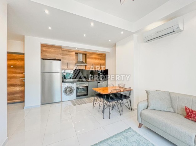 Стильная квартира 1+1 в современном комплексе  в районе Махмутлар — отличный вариант для комфортной жизни у моря. - Ракурс 2