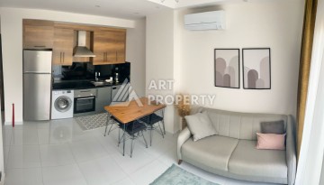 Стильная квартира 1+1 в современном комплексе  в районе Махмутлар — отличный вариант для комфортной жизни у моря. - Ракурс 10