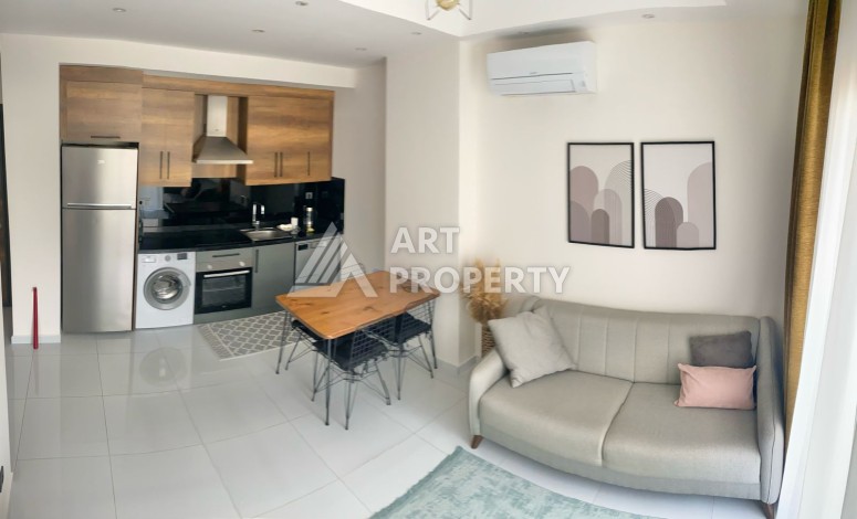 Стильная квартира 1+1 в современном комплексе  в районе Махмутлар — отличный вариант для комфортной жизни у моря. - Ракурс 9