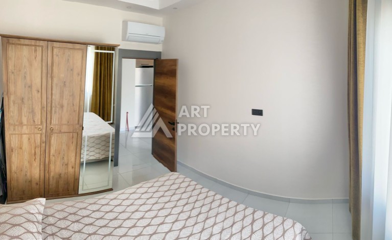 Стильная квартира 1+1 в современном комплексе  в районе Махмутлар — отличный вариант для комфортной жизни у моря. - Ракурс 12