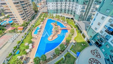 Стильная квартира 1+1 в современном комплексе  в районе Махмутлар — отличный вариант для комфортной жизни у моря. - Ракурс 1