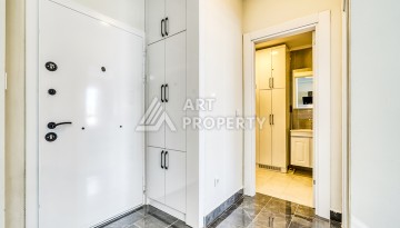 Современная квартира планировки 1+1 с мебелью и техникой в комплексе с богатой инфраструктурой в районе в Махмутларе. - Ракурс 2