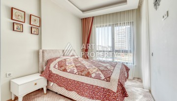 Современная квартира планировки 1+1 с мебелью и техникой в комплексе с богатой инфраструктурой в районе в Махмутларе. - Ракурс 3