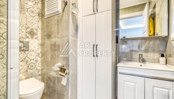 Современная квартира планировки 1+1 с мебелью и техникой в комплексе с богатой инфраструктурой в районе в Махмутларе. - Ракурс 8