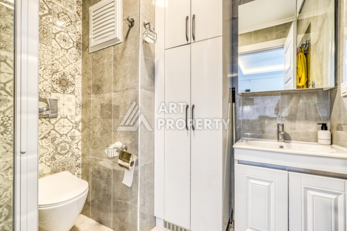 Современная квартира планировки 1+1 с мебелью и техникой в комплексе с богатой инфраструктурой в районе в Махмутларе. - Ракурс 7