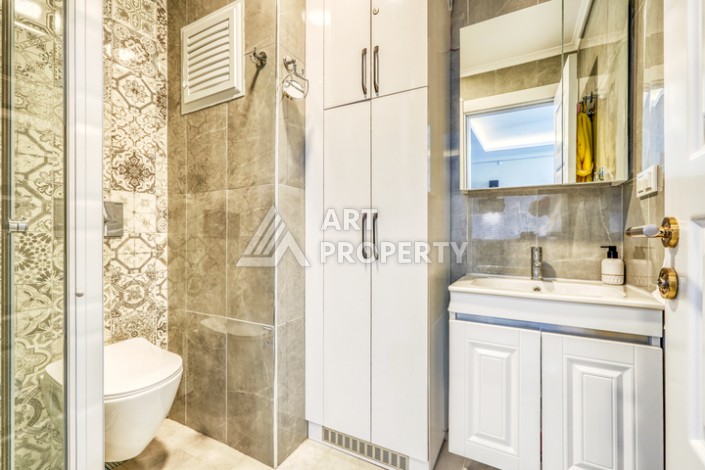 Современная квартира планировки 1+1 с мебелью и техникой в комплексе с богатой инфраструктурой в районе в Махмутларе. - Ракурс 9