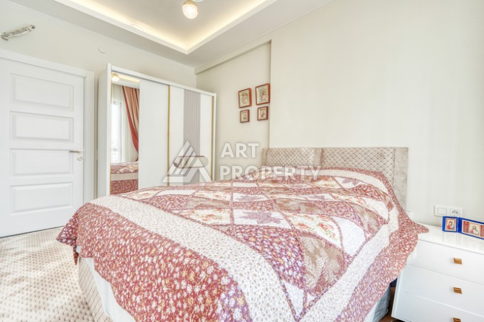 Современная квартира планировки 1+1 с мебелью и техникой в комплексе с богатой инфраструктурой в районе в Махмутларе. - Ракурс 10