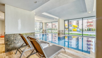 Современная квартира планировки 1+1 с мебелью и техникой в комплексе с богатой инфраструктурой в районе в Махмутларе. - Ракурс 13