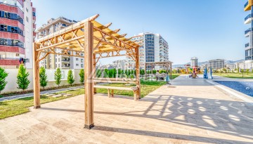 Современная квартира планировки 1+1 с мебелью и техникой в комплексе с богатой инфраструктурой в районе в Махмутларе. - Ракурс 16