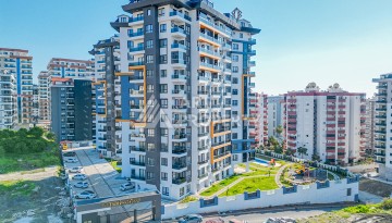 Современная квартира планировки 1+1 с мебелью и техникой в комплексе с богатой инфраструктурой в районе в Махмутларе. - Ракурс 17