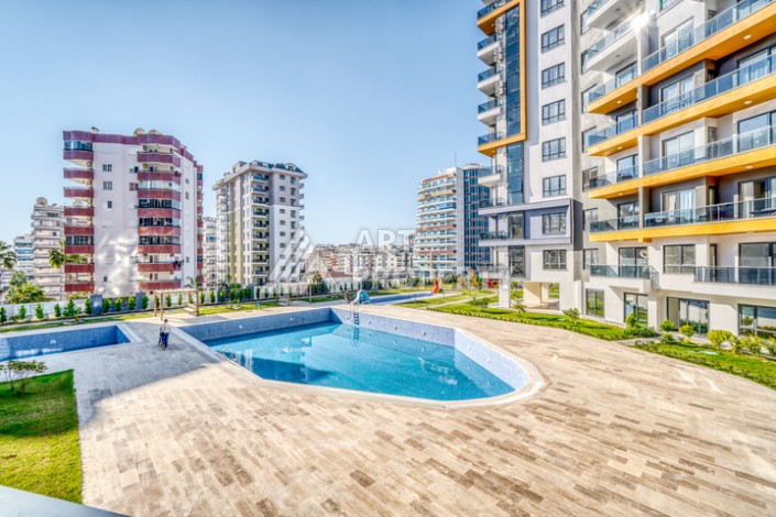 Современная квартира планировки 1+1 с мебелью и техникой в комплексе с богатой инфраструктурой в районе в Махмутларе. - Ракурс 19