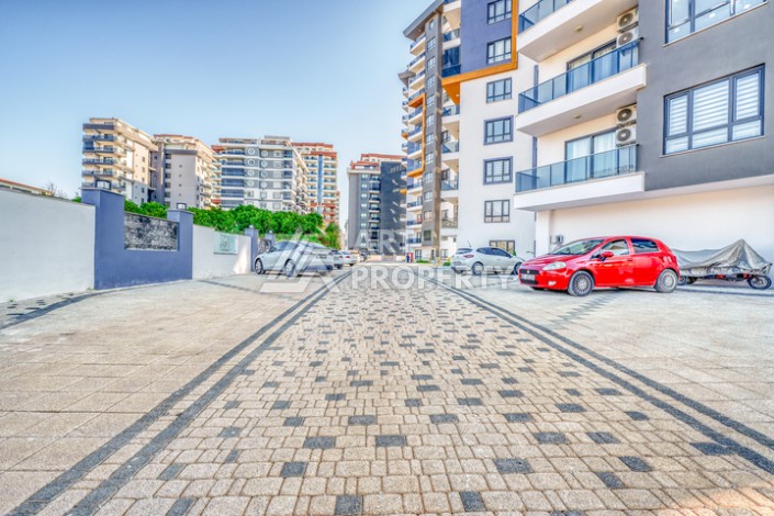 Современная квартира планировки 1+1 с мебелью и техникой в комплексе с богатой инфраструктурой в районе в Махмутларе. - Ракурс 20