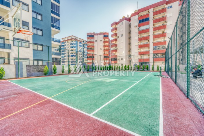 Современная квартира планировки 1+1 с мебелью и техникой в комплексе с богатой инфраструктурой в районе в Махмутларе. - Ракурс 24