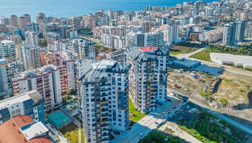 Современная квартира планировки 1+1 с мебелью и техникой в комплексе с богатой инфраструктурой в районе в Махмутларе. - Ракурс 28