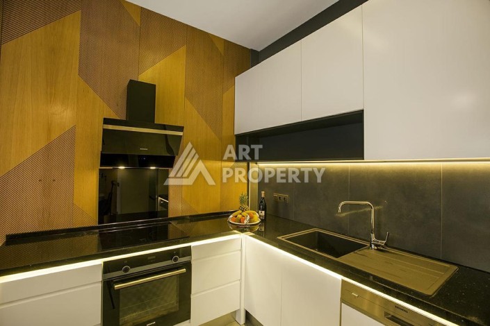 Современная квартира 1+1 в престижном комплексе в центре Алании. - Ракурс 1