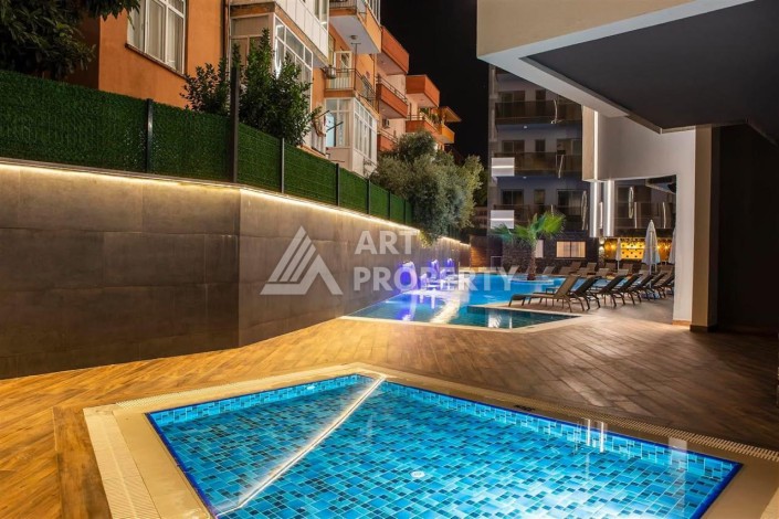 Современная квартира 1+1 в престижном комплексе в центре Алании. - Ракурс 12